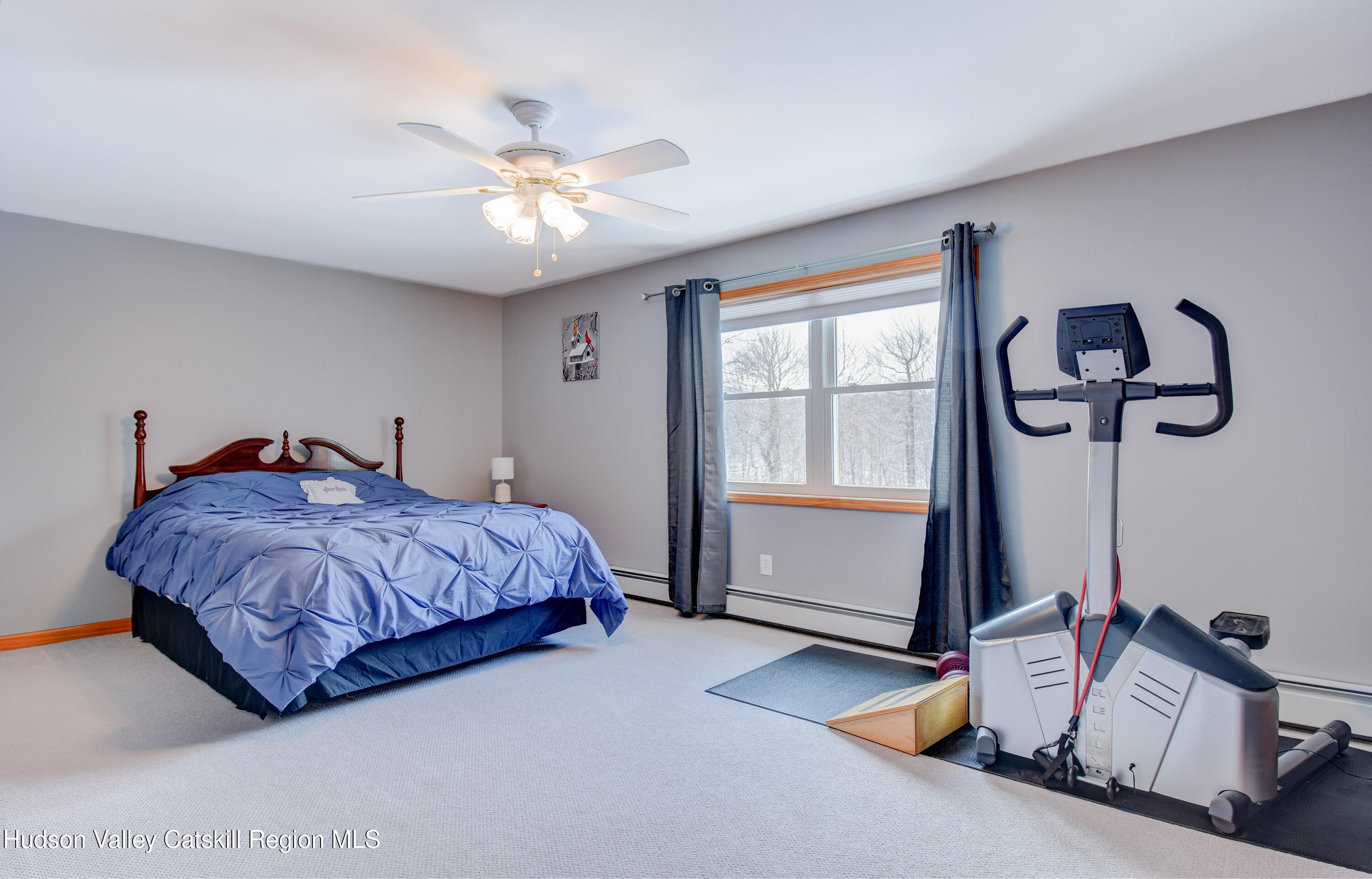 309 Quannacut Road Pine Bush, NY 12566 - Photo 17 of 43 a spacious bedroom with a bed and window