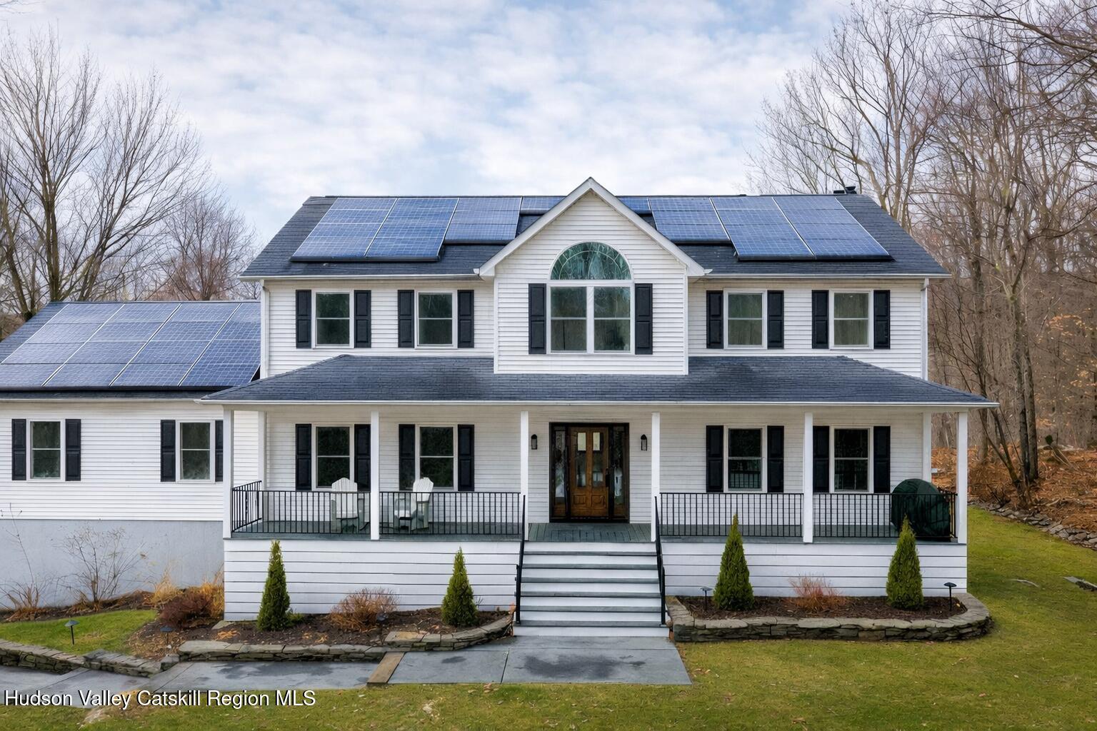 309 Quannacut Road Pine Bush, NY 12566 - Photo 2 of 43 a front view of a house with swimming pool and chairs