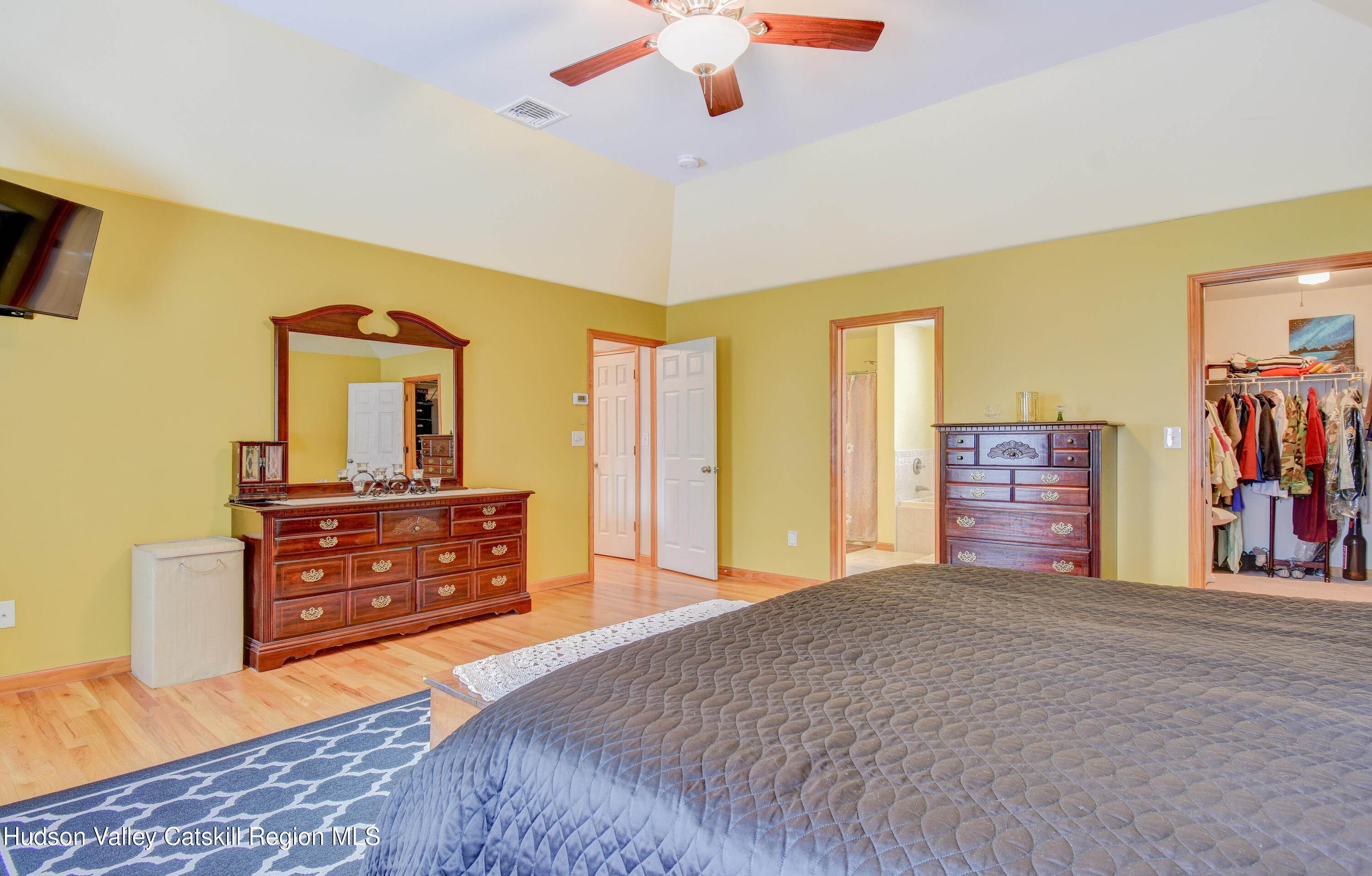 309 Quannacut Road Pine Bush, NY 12566 - Photo 21 of 43 a bedroom with a bed and a dresser