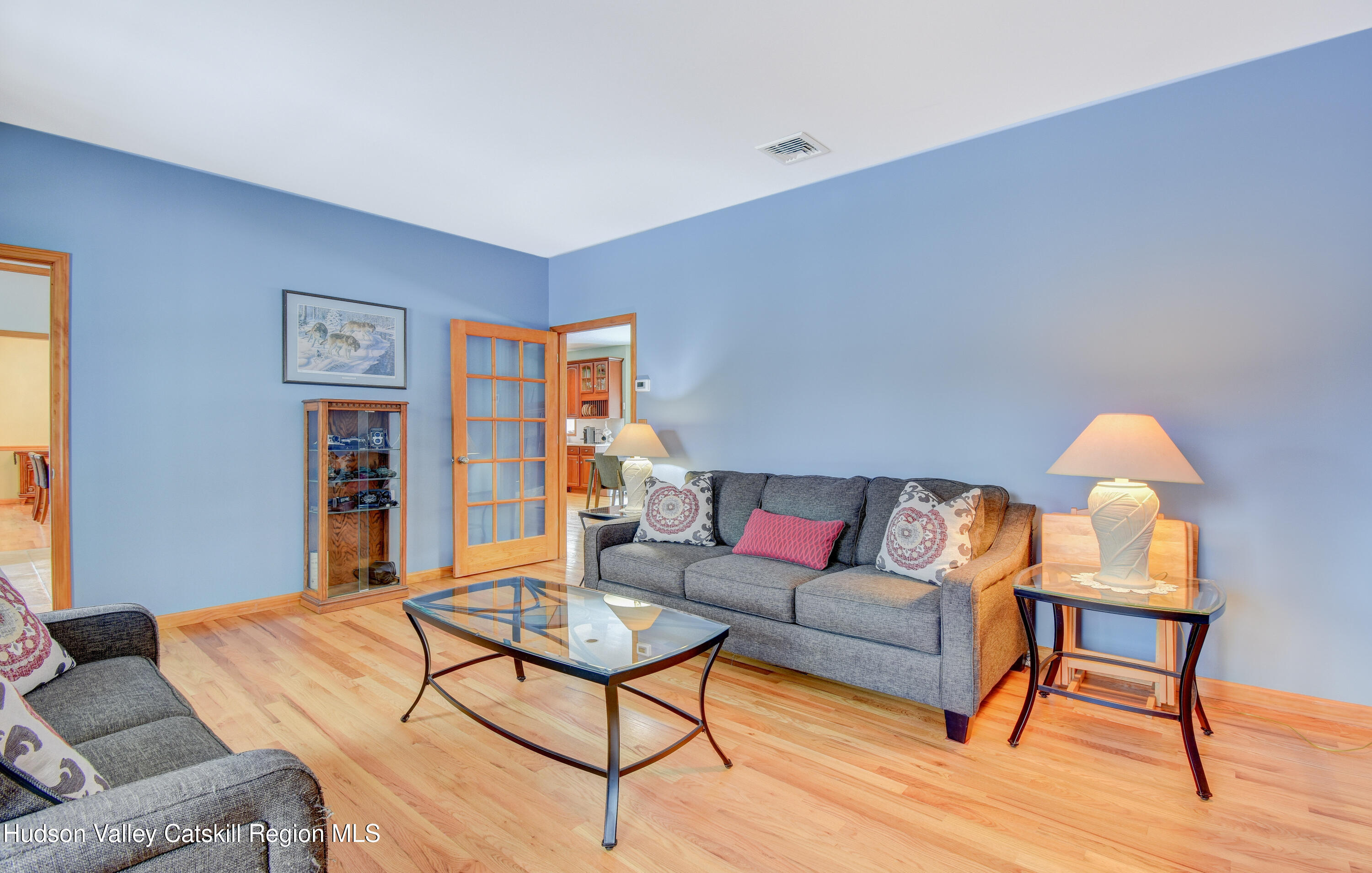 309 Quannacut Road Pine Bush, NY 12566 - Photo 29 of 43 a living room with furniture and wooden floor