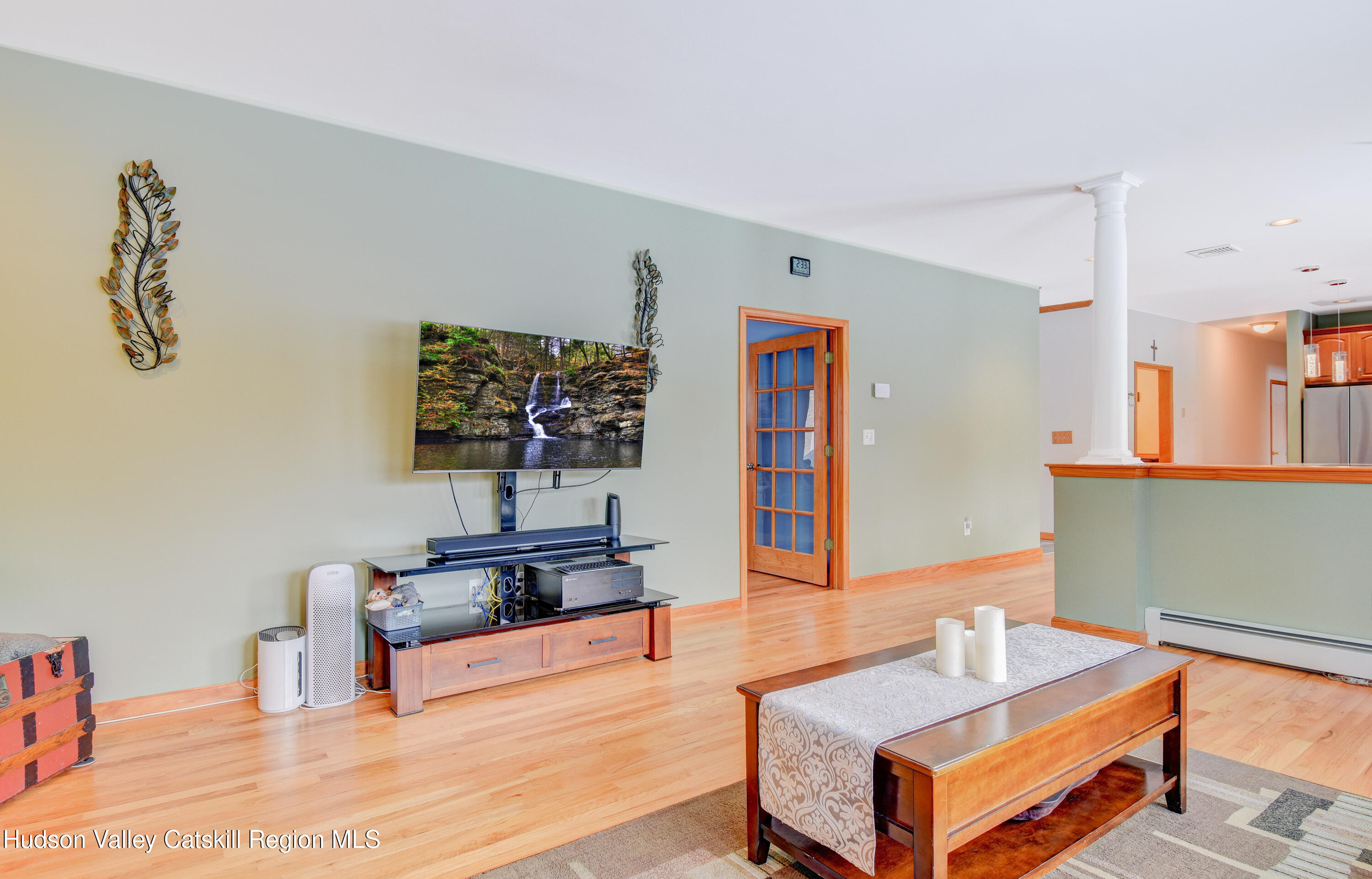 309 Quannacut Road Pine Bush, NY 12566 - Photo 31 of 43 a living room with furniture and wooden floor