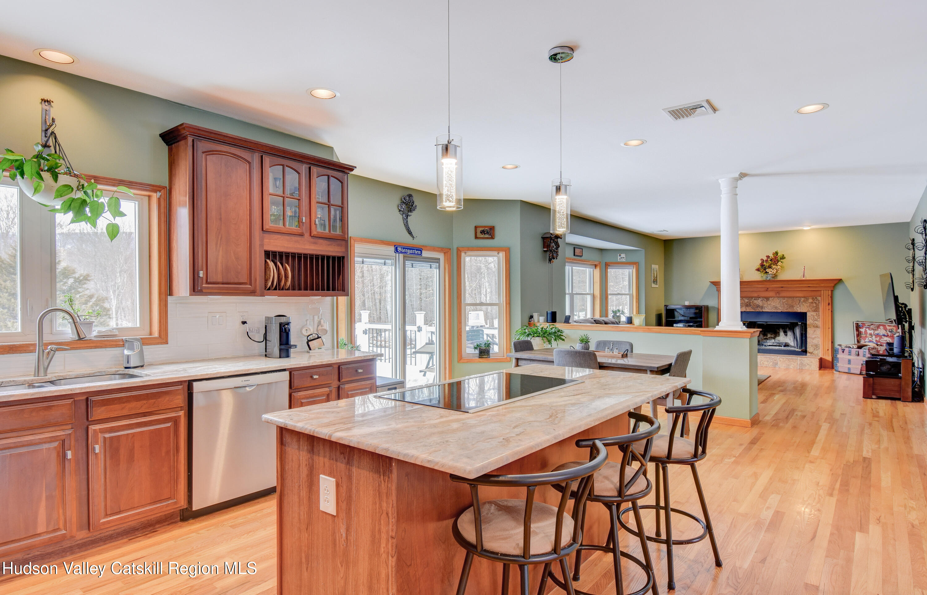 309 Quannacut Road Pine Bush, NY 12566 - Photo 35 of 43 a kitchen with a table chairs stove and cabinets