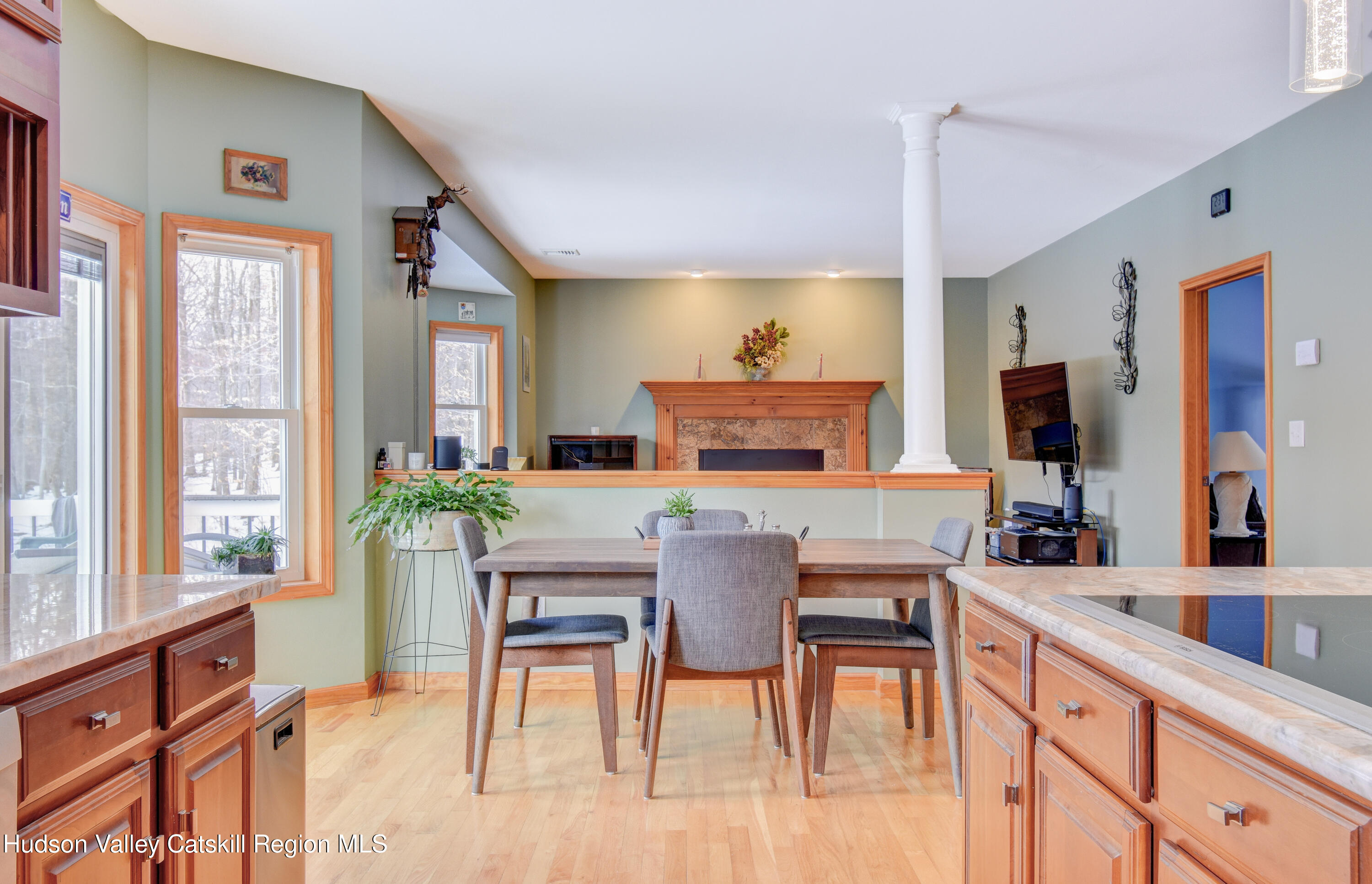 309 Quannacut Road Pine Bush, NY 12566 - Photo 36 of 43 a view of a dining room with furniture window and wooden floor