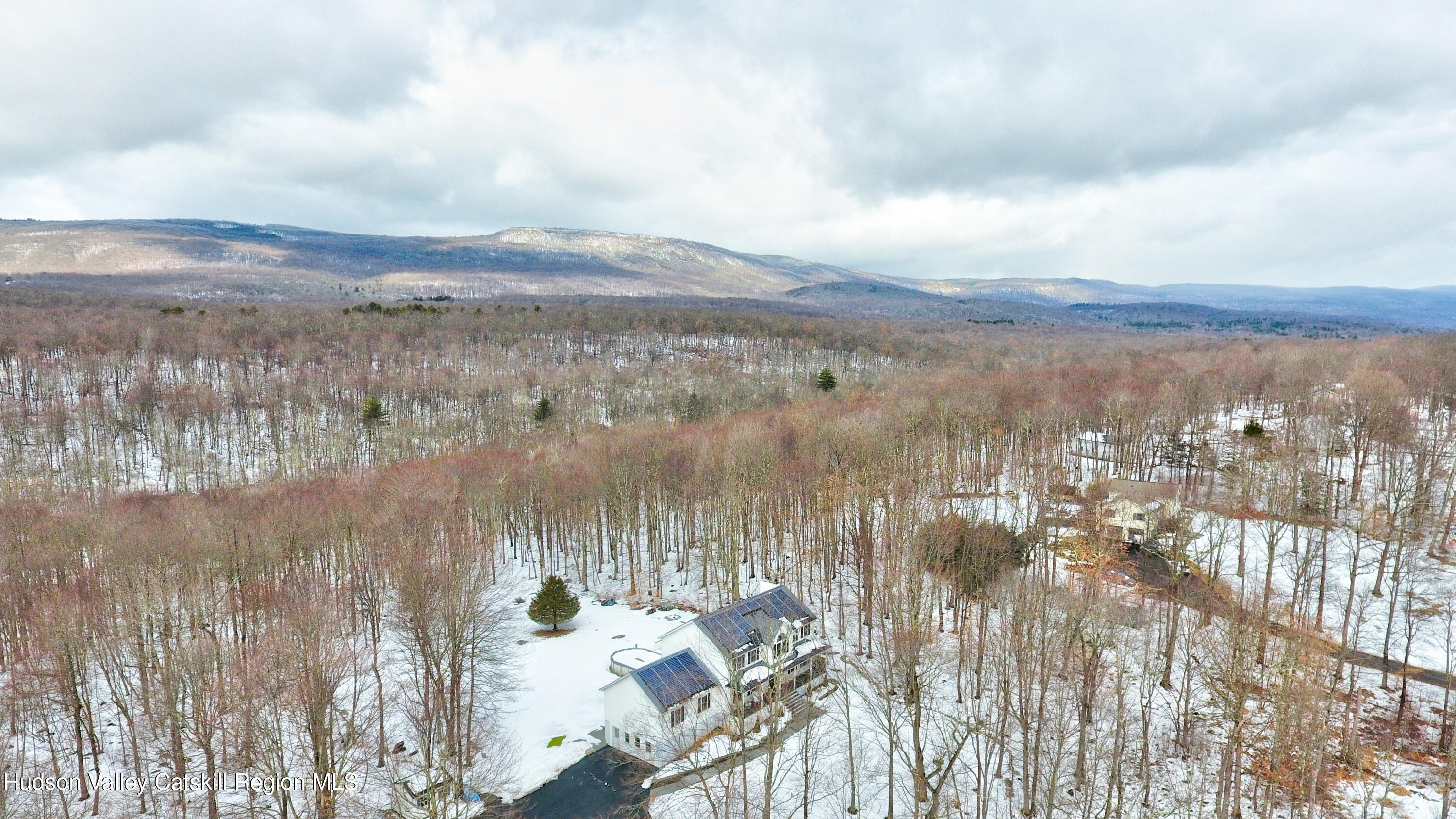 309 Quannacut Road Pine Bush, NY 12566 - Photo 41 of 43 a view of a lake with houses in the back