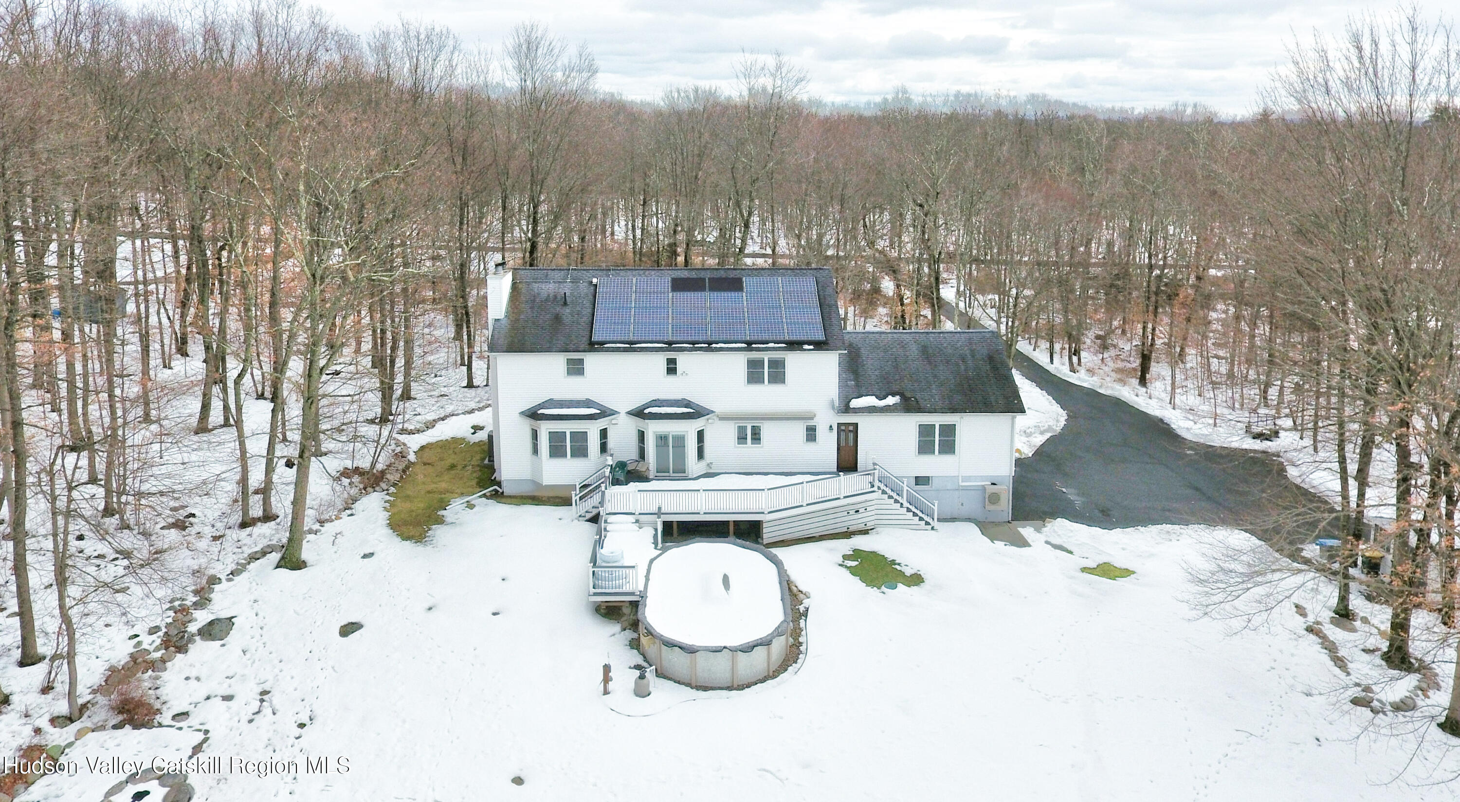 309 Quannacut Road Pine Bush, NY 12566 - Photo 5 of 43 a view of table and chairs in the patio