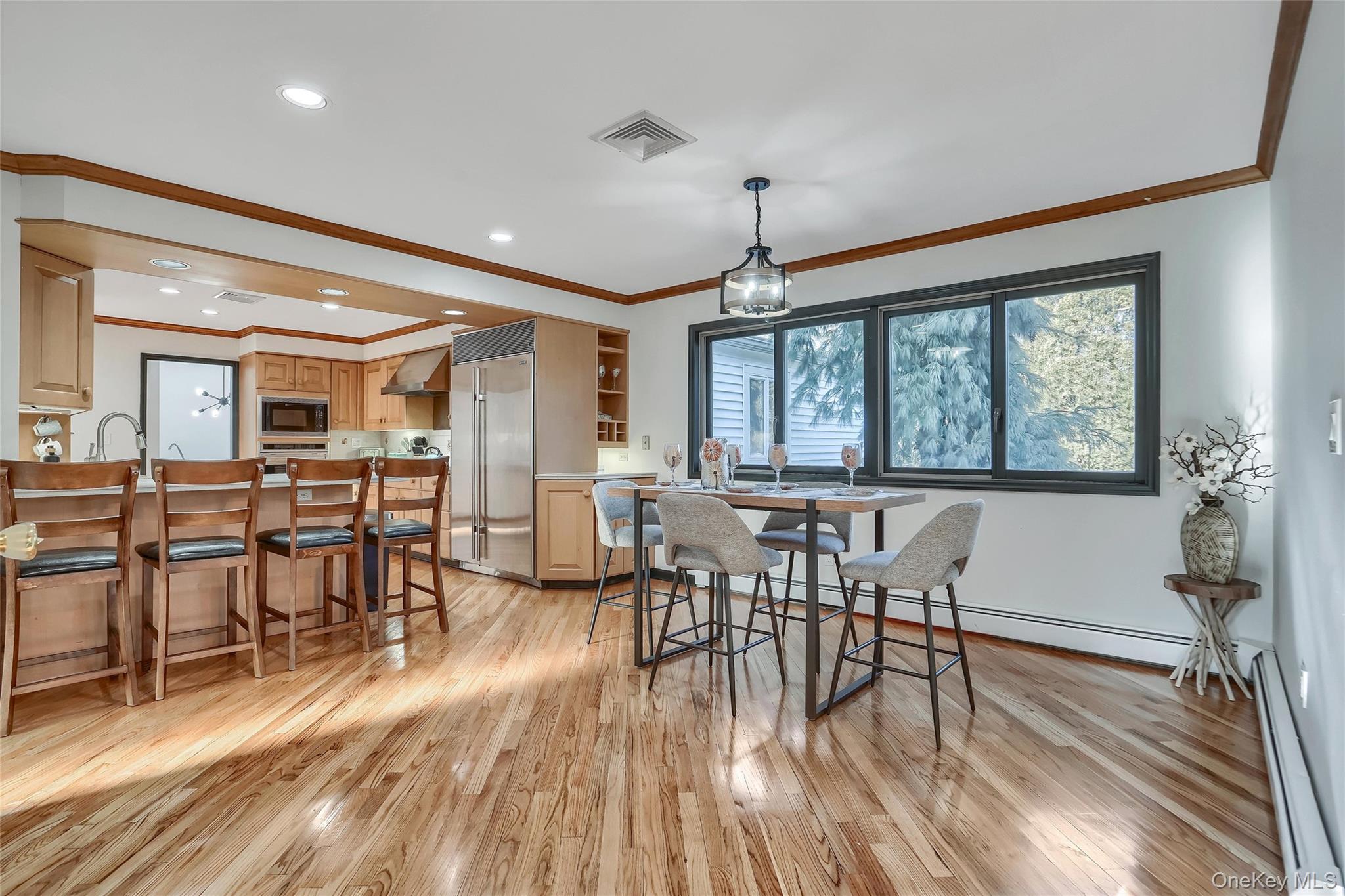 283 Prospect Road Monroe, NY 10950 - Photo 17 of 26 a view of a dining room with furniture window and wooden floor