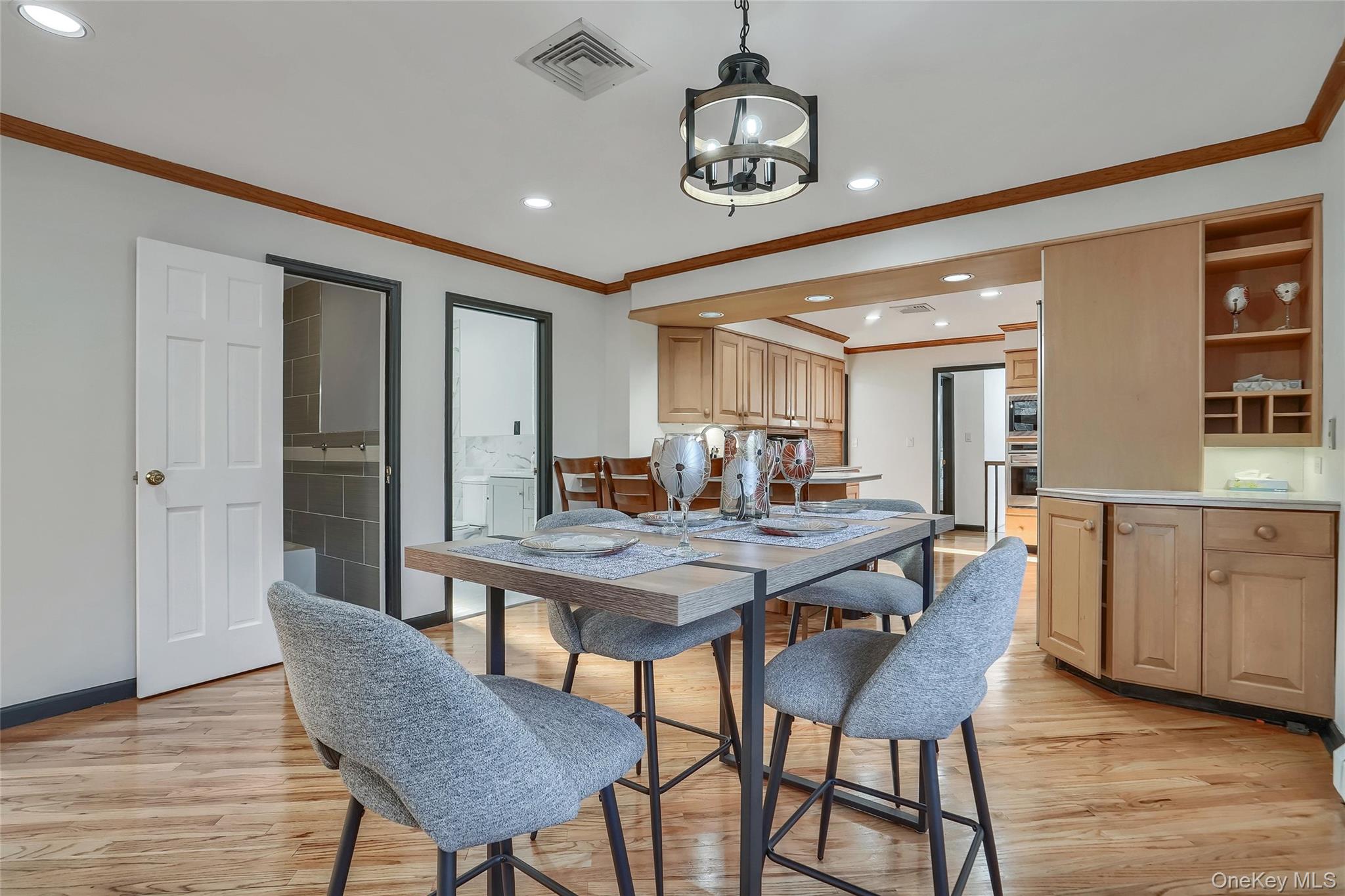 283 Prospect Road Monroe, NY 10950 - Photo 18 of 26 a view of a dining room with furniture window and wooden floor