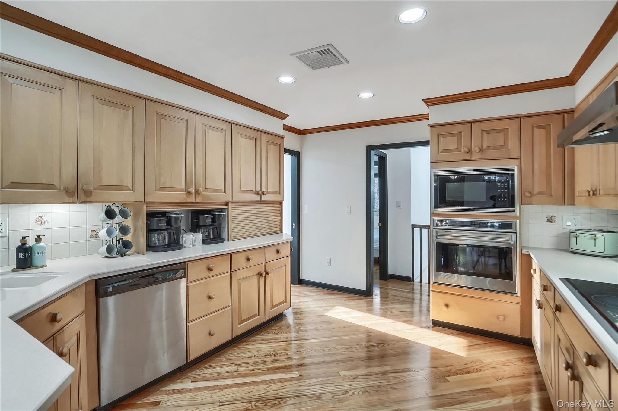 283 Prospect Road Monroe, NY 10950 - Photo 19 of 26 a kitchen with stainless steel appliances granite countertop a stove and a refrigerator