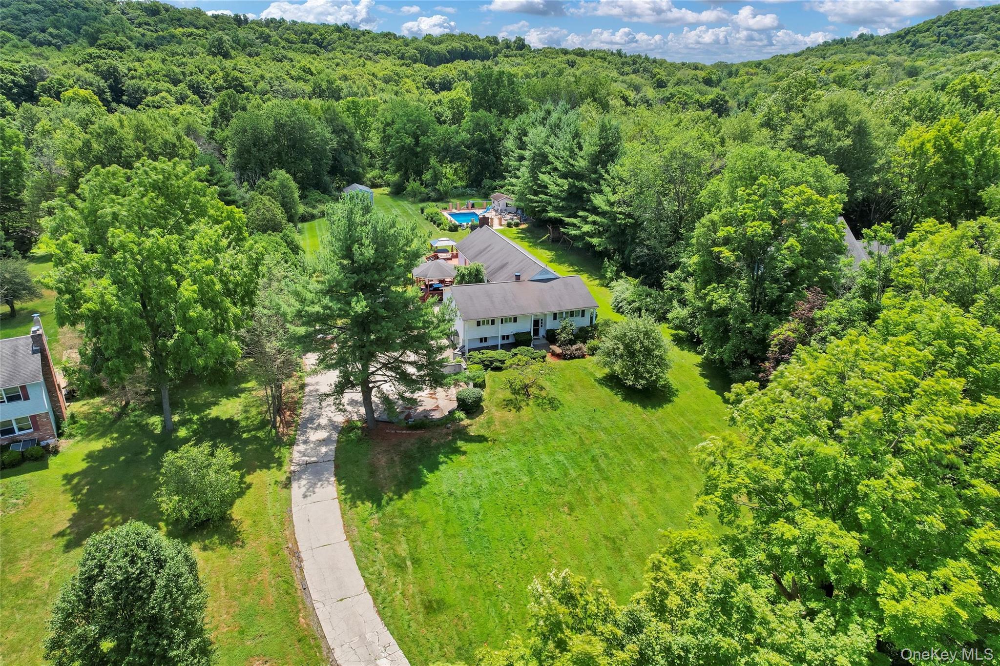 283 Prospect Road Monroe, NY 10950 - Photo 4 of 26 an aerial view of a house with a yard