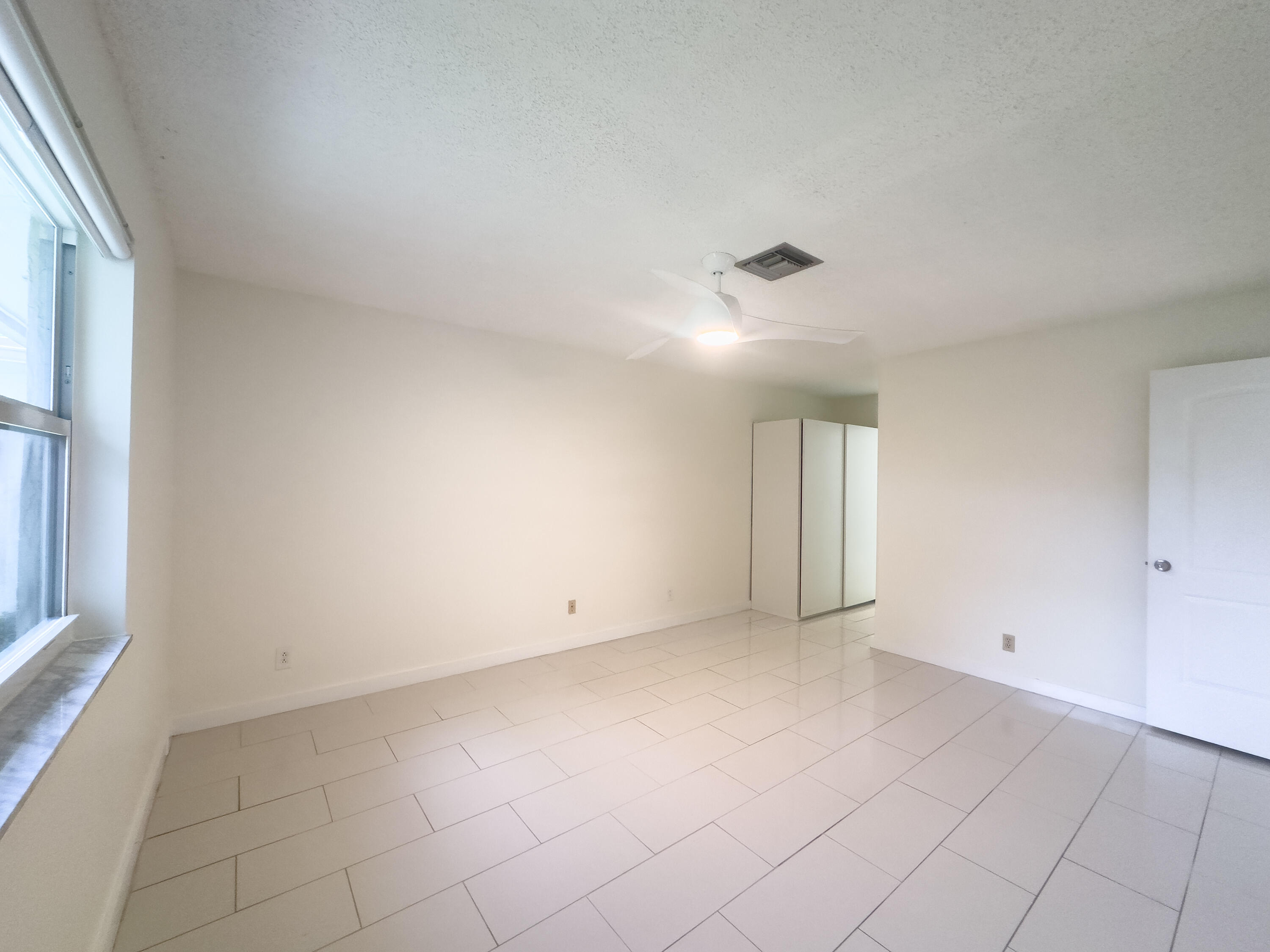 13741 Flora Place, Unit B Delray Beach, FL 33484 - Photo 12 of 34 Primary Bedroom