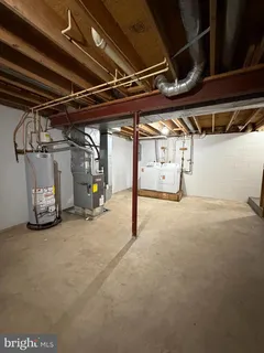 a view of empty room with wooden ceiling