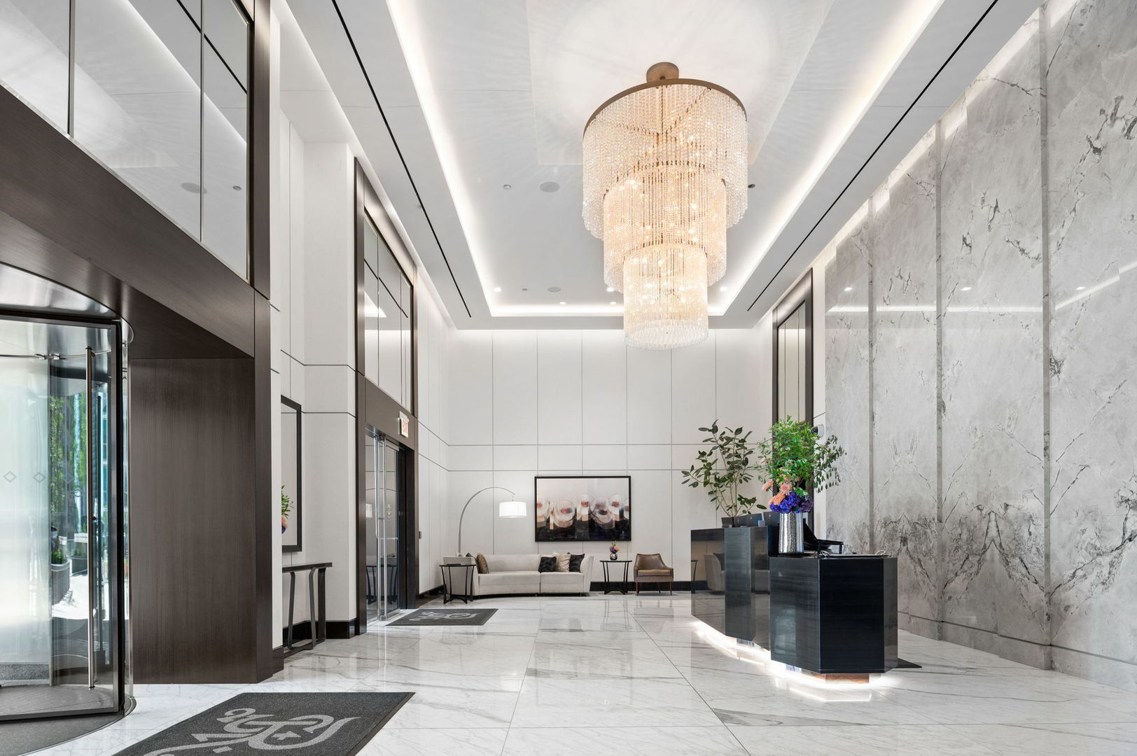 363 East Wacker Drive, Unit 3109 Chicago, IL 60601 - Photo 2 of 23 a living room with furniture potted plant and a mirror