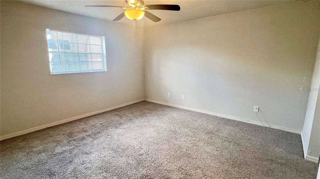 711 Russell Lane, Unit 134 Brandon, FL 33510 - Photo 13 of 24 an empty room with a window