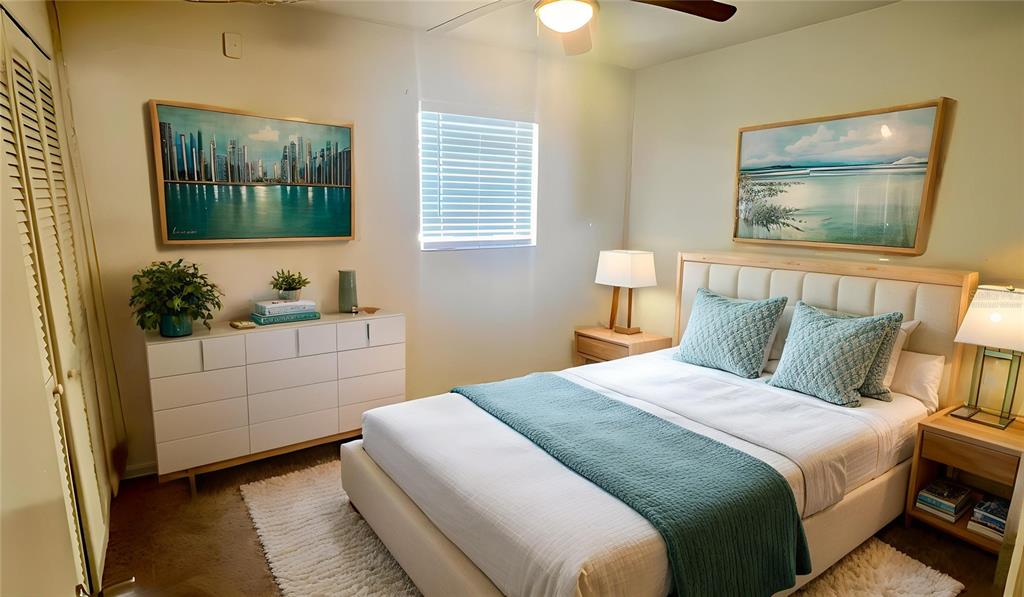 711 Russell Lane, Unit 134 Brandon, FL 33510 - Photo 18 of 24 a bedroom with a bed and a painting on the wall