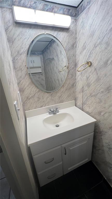 711 Russell Lane, Unit 134 Brandon, FL 33510 - Photo 10 of 24 a bathroom with a sink and vanity