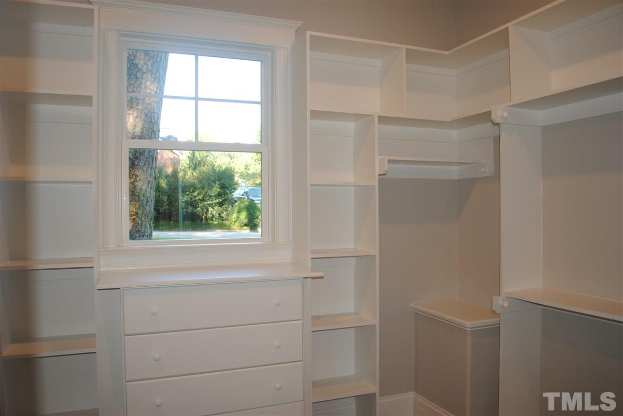 1220 Mitchell Street Raleigh, NC 27607 - Photo 12 of 25 a bathroom with a shower and a window