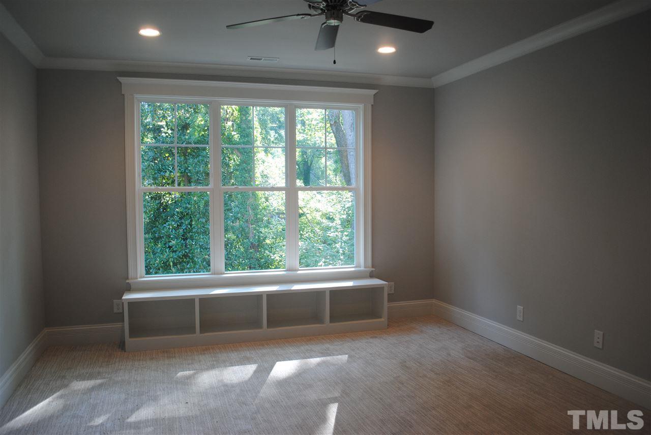 1220 Mitchell Street Raleigh, NC 27607 - Photo 14 of 25 en empty room with a window