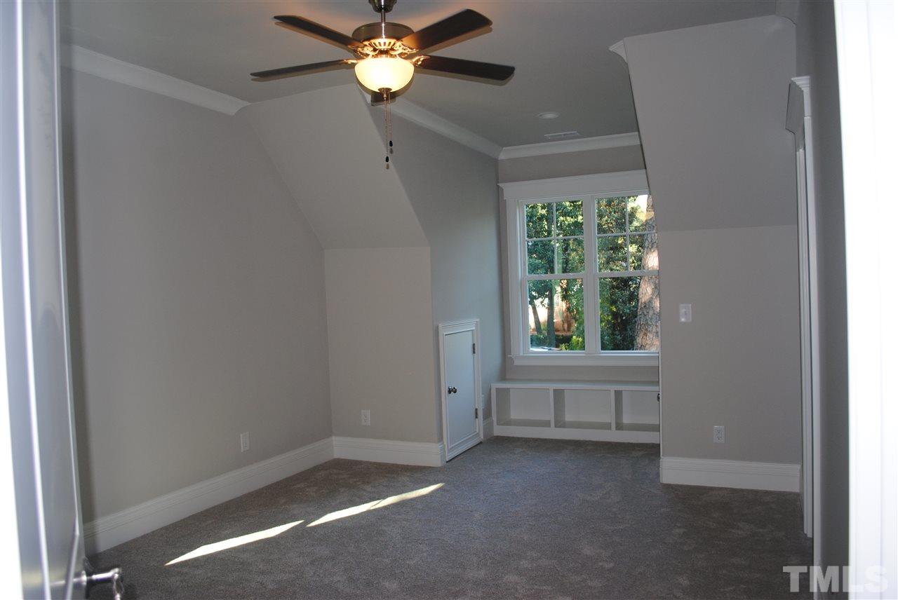 1220 Mitchell Street Raleigh, NC 27607 - Photo 16 of 25 a view of an empty room with a window