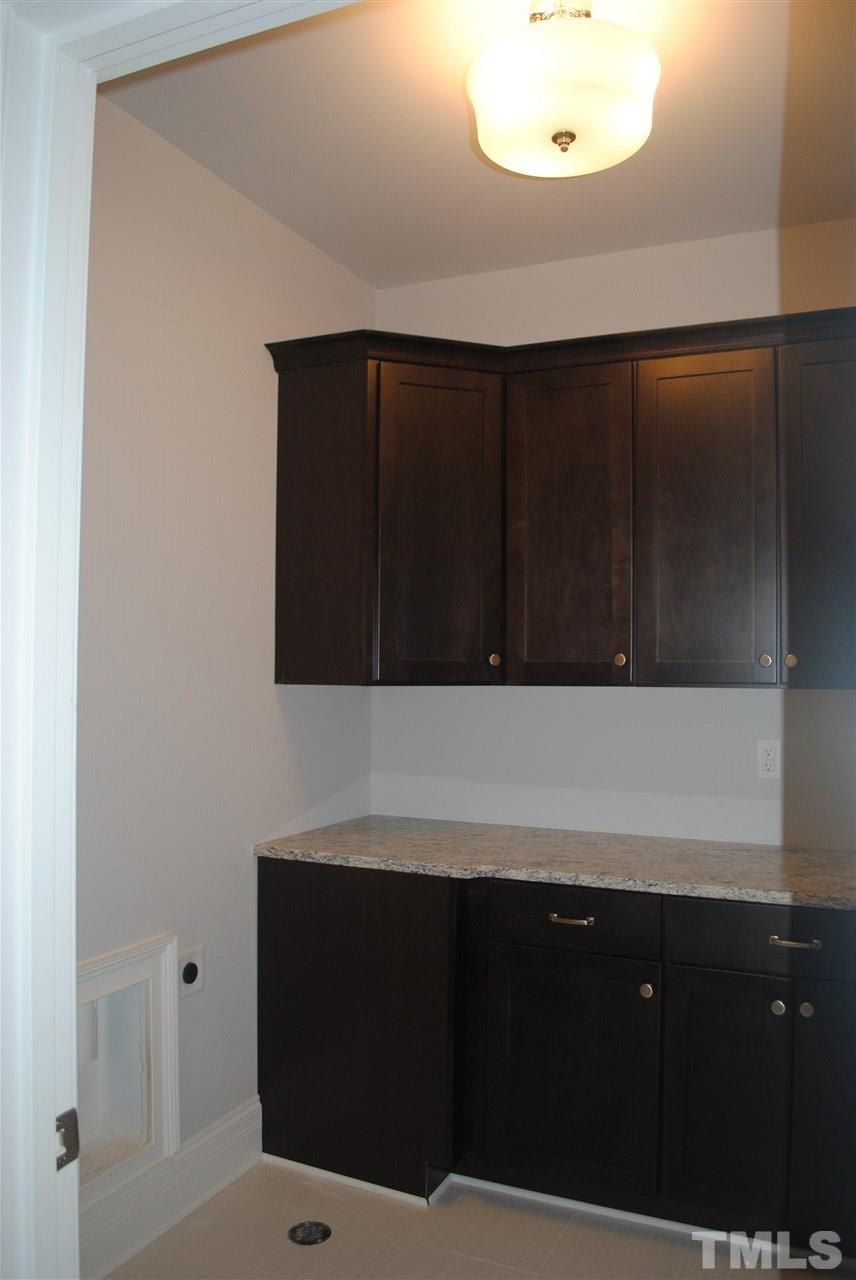 1220 Mitchell Street Raleigh, NC 27607 - Photo 18 of 25 a bathroom with a sink