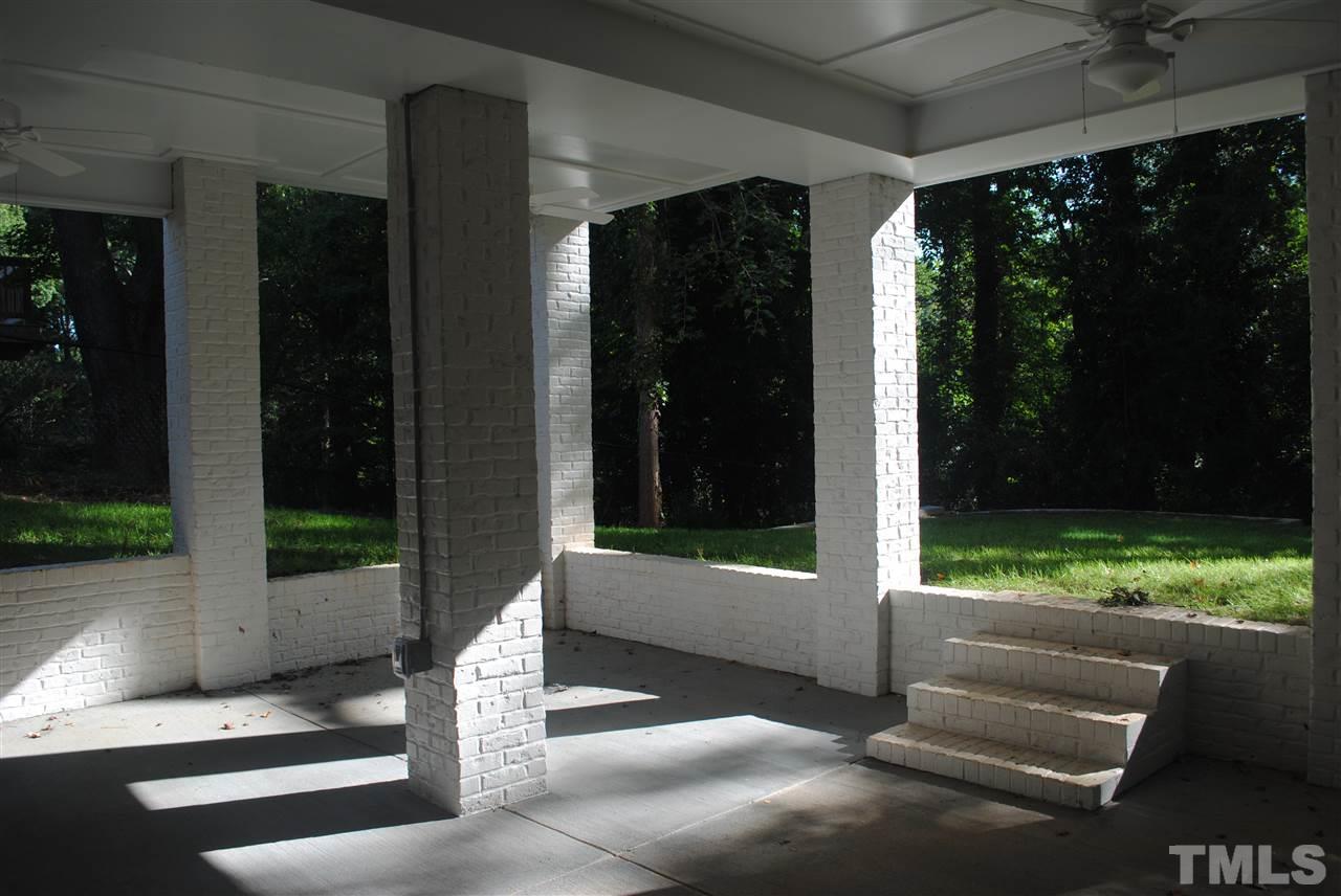 1220 Mitchell Street Raleigh, NC 27607 - Photo 21 of 25 a front view of a house with garden