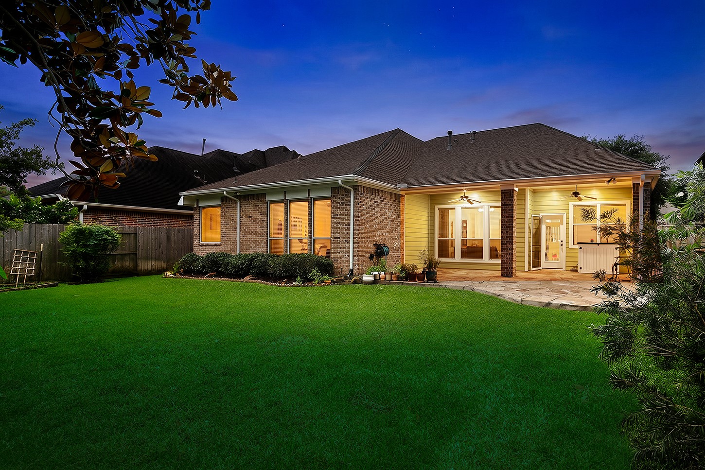 18722 Duke Lake Drive Spring, TX 77388 - Photo 20 of 26 a front view of a house with a garden