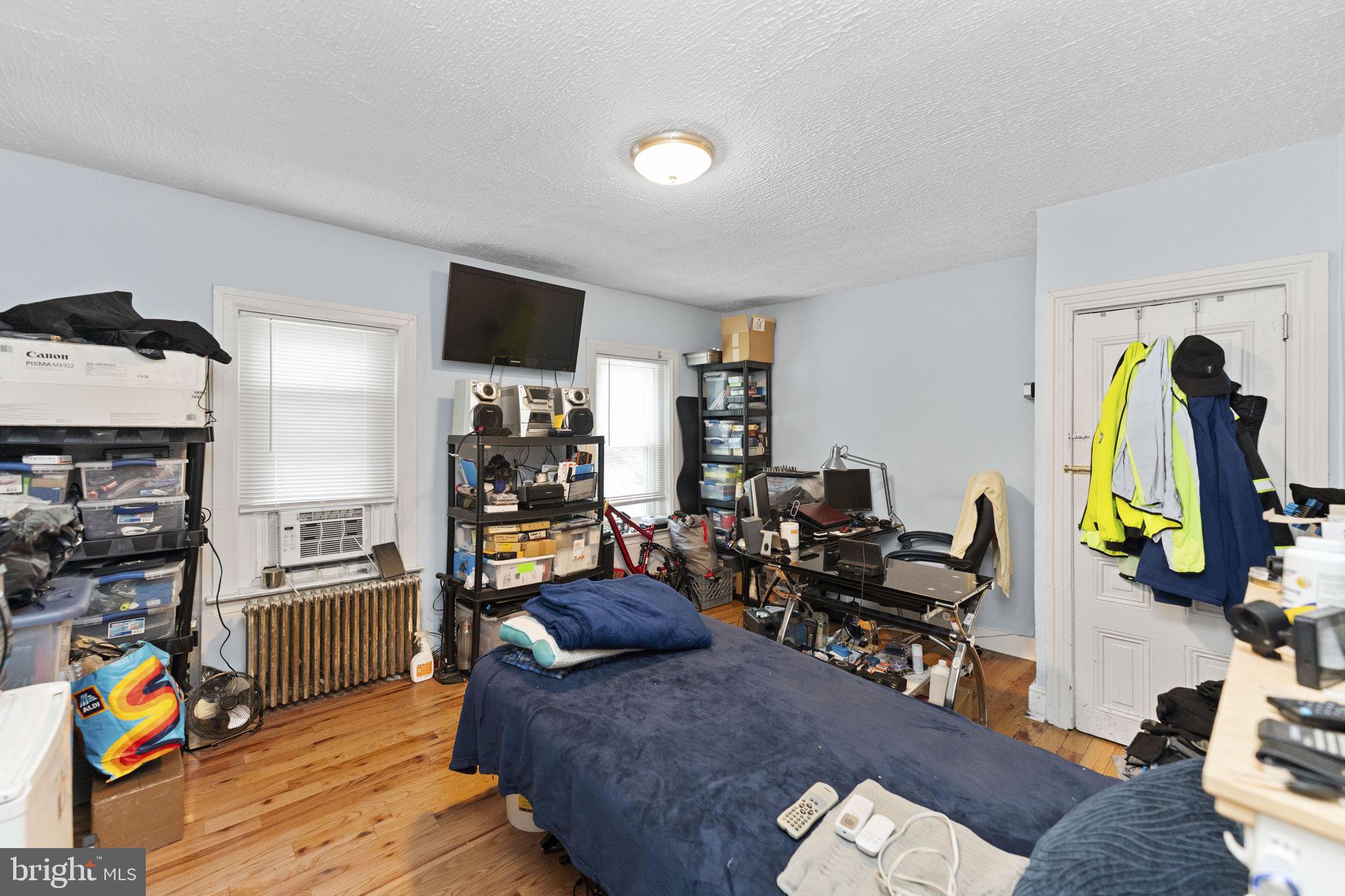 366 East Moore Street Norristown, PA 19401 - Photo 15 of 20 a living room with furniture and a flat screen tv