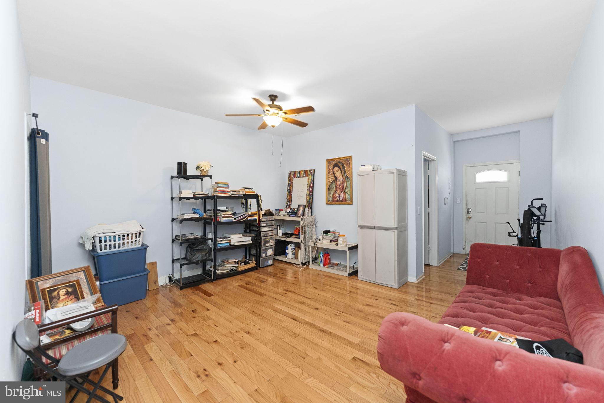 366 East Moore Street Norristown, PA 19401 - Photo 6 of 20 a bed room with a bed and a chair