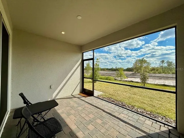 a view of a balcony with an ocean view