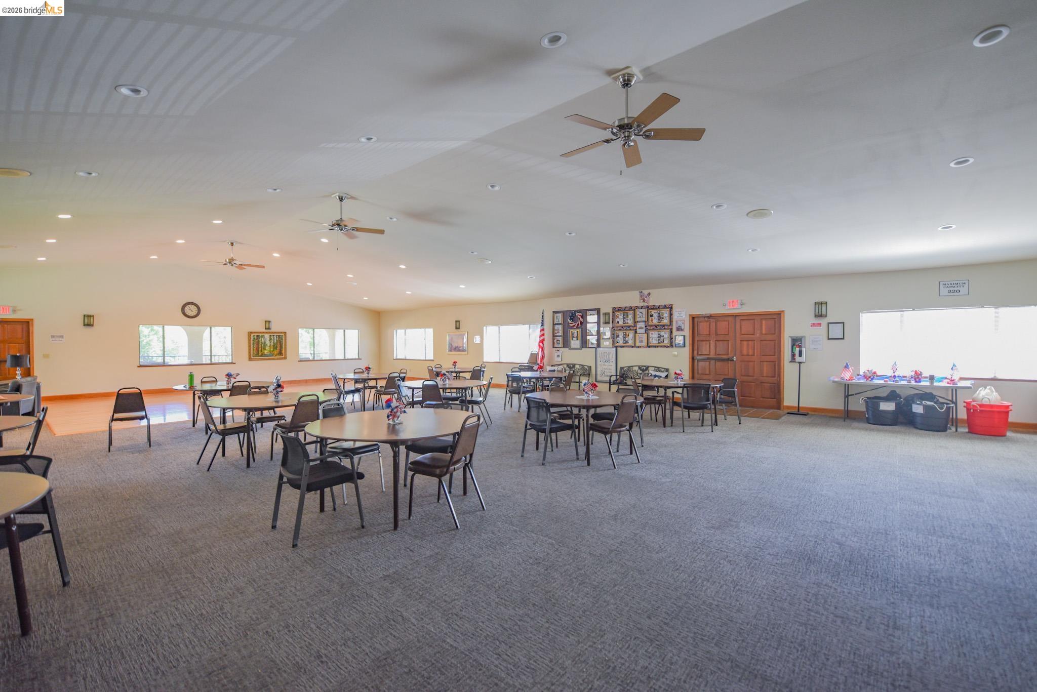 18717 Mill Villa Road, Unit 235 Jamestown, CA 95327 - Photo 20 of 26 Carpeted dining area with lofted ceiling, recessed lighting, and ceiling fan