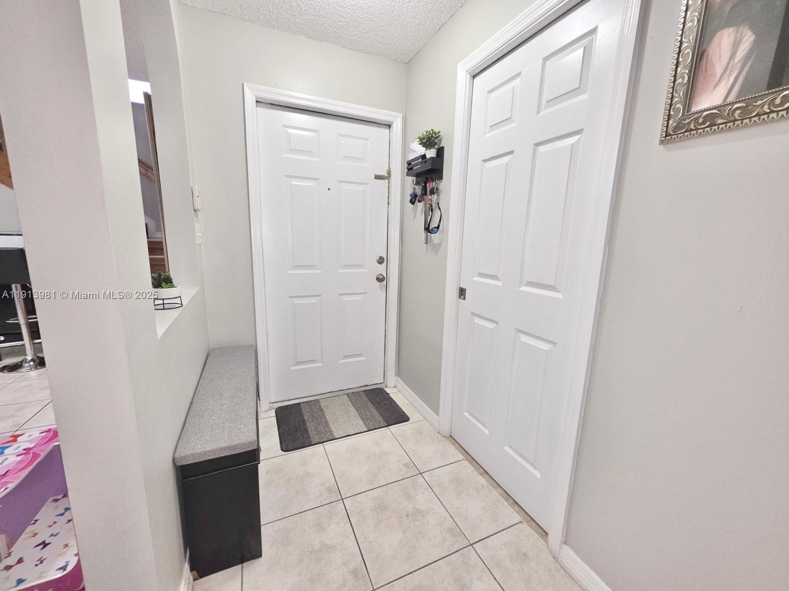 15871 Southwest 86th Terrace Miami, FL 33193 - Photo 11 of 30 a bathroom with a sink a toilet and a shower
