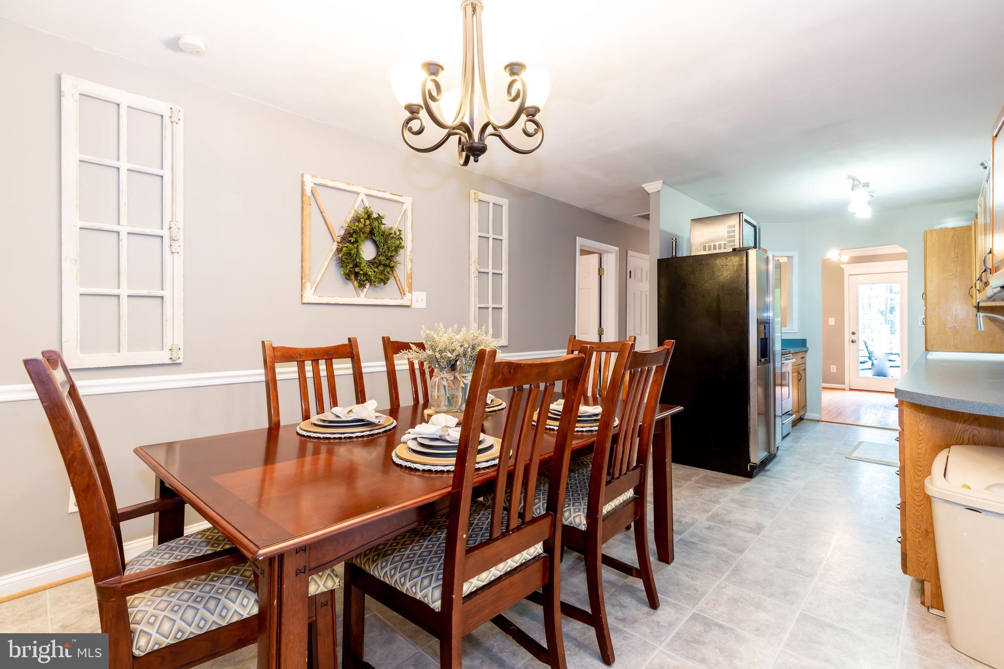 12503 Purcell Road Manassas, VA 20112 - Photo 15 of 46 View into kitchen from dining room