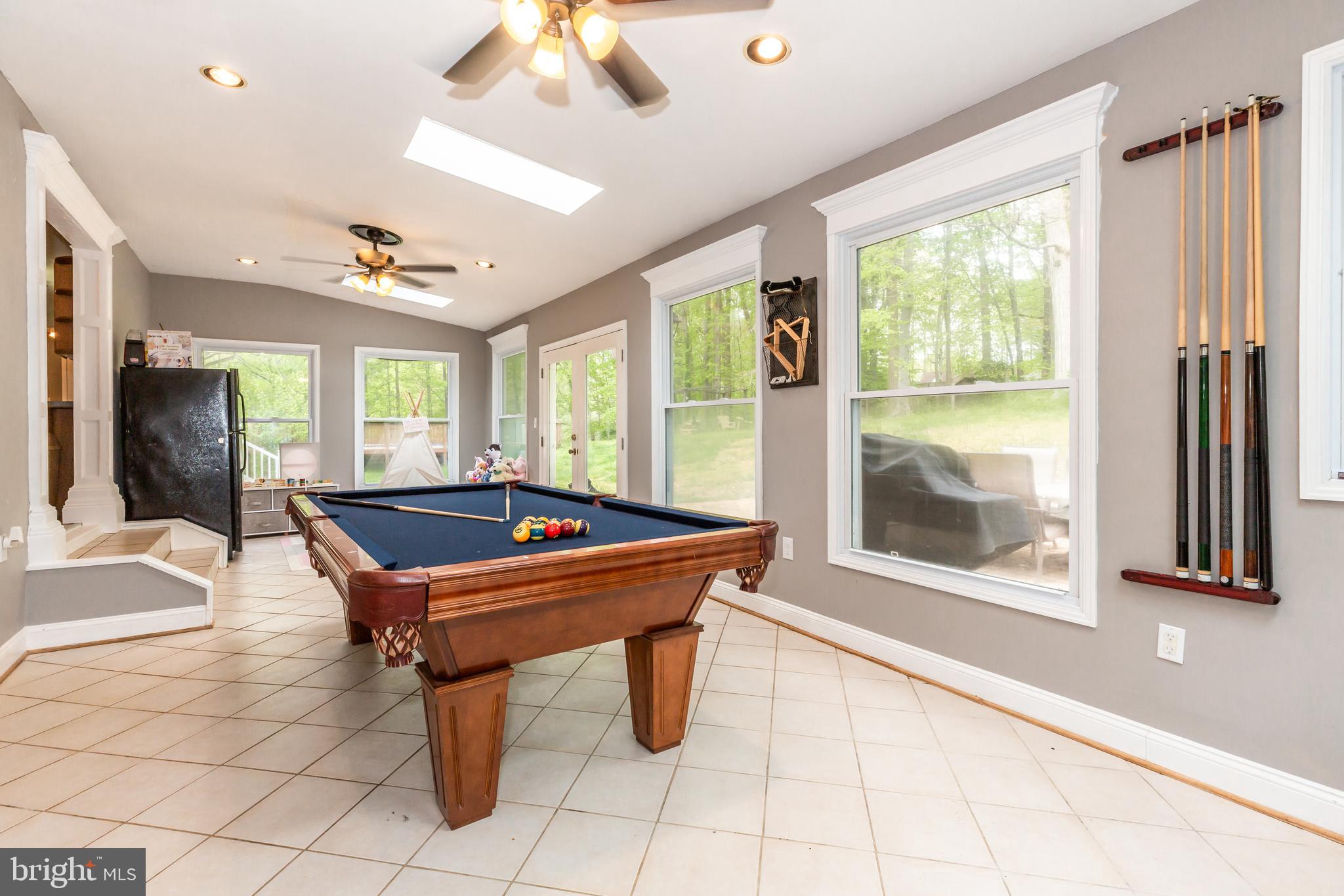 12503 Purcell Road Manassas, VA 20112 - Photo 20 of 46 Large sunroom overlooking backyard