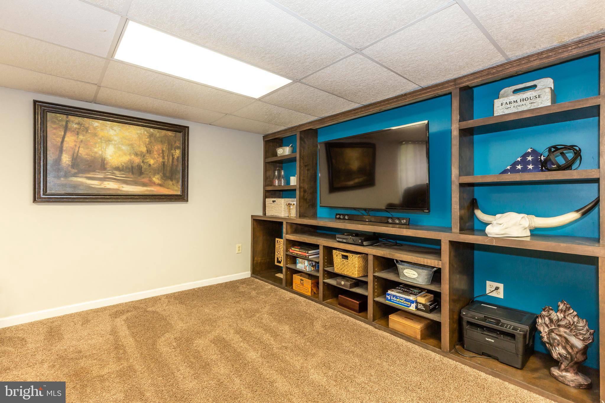 12503 Purcell Road Manassas, VA 20112 - Photo 32 of 46 Media room has built in shelving