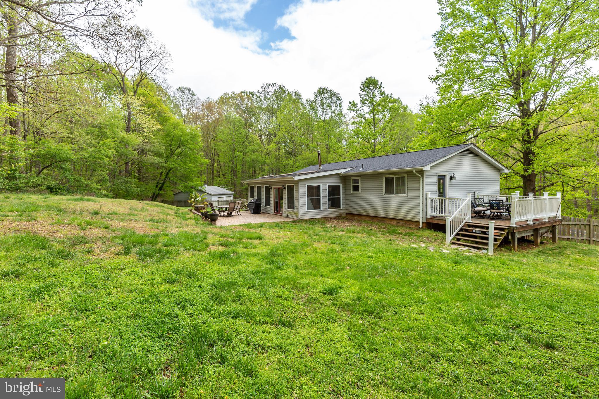 12503 Purcell Road Manassas, VA 20112 - Photo 44 of 46 Side deck, patio and sunroom on 1.5 acre lot