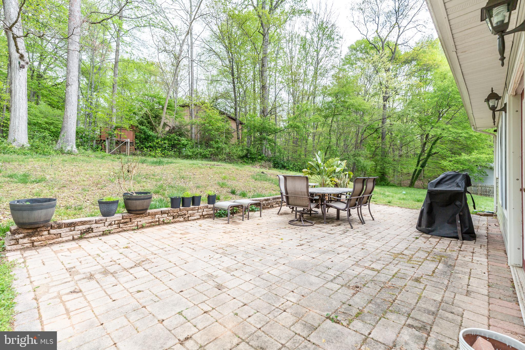 12503 Purcell Road Manassas, VA 20112 - Photo 46 of 46 Large patio to enjoy off of the sunroom