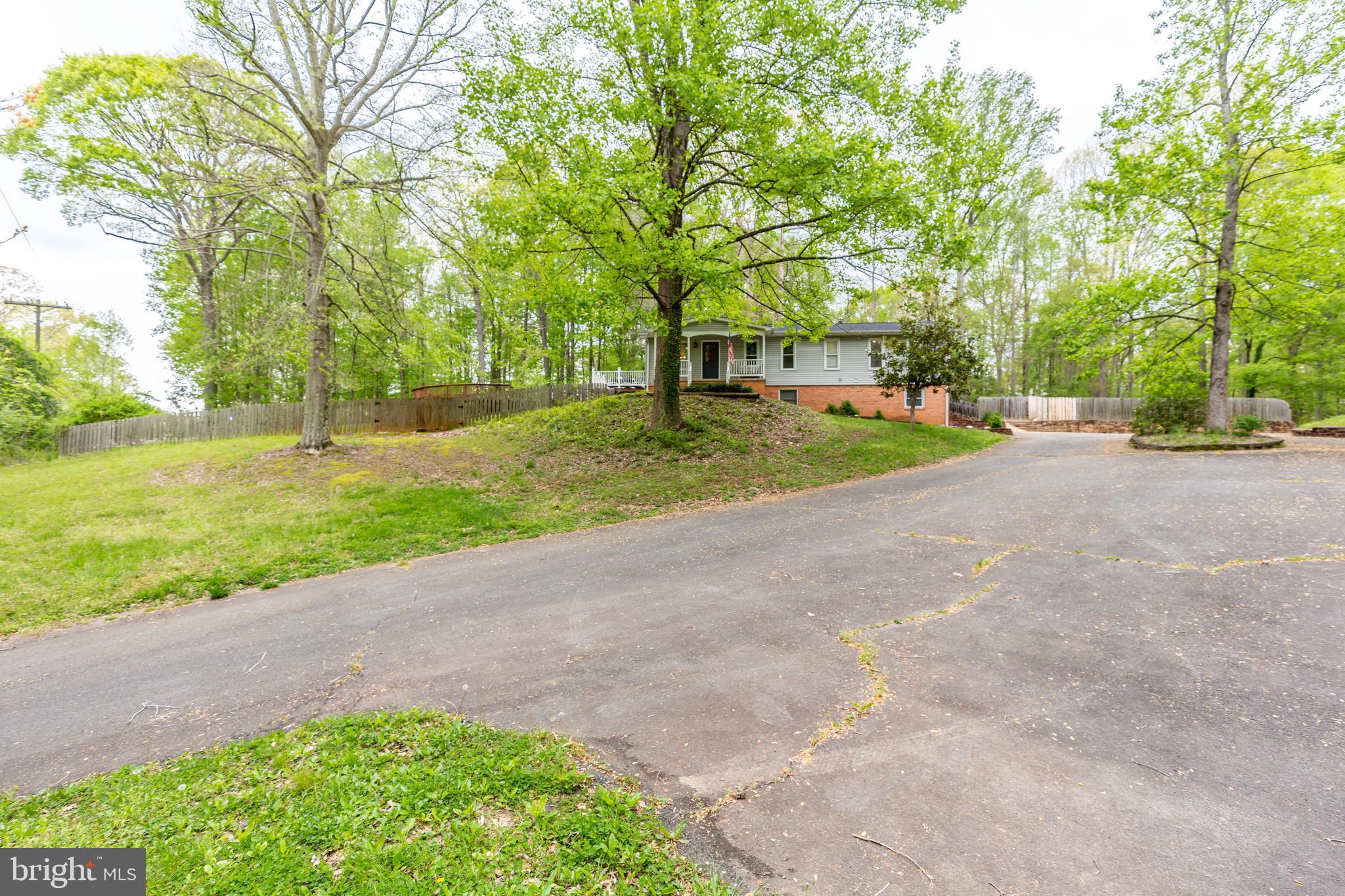 12503 Purcell Road Manassas, VA 20112 - Photo 7 of 46 Long paved driveway with a lot of parking