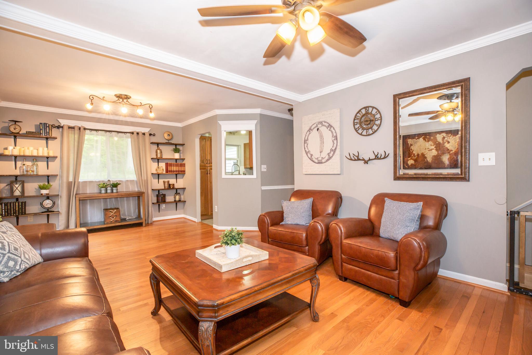 12503 Purcell Road Manassas, VA 20112 - Photo 10 of 46 Family room with custom window trim and crown