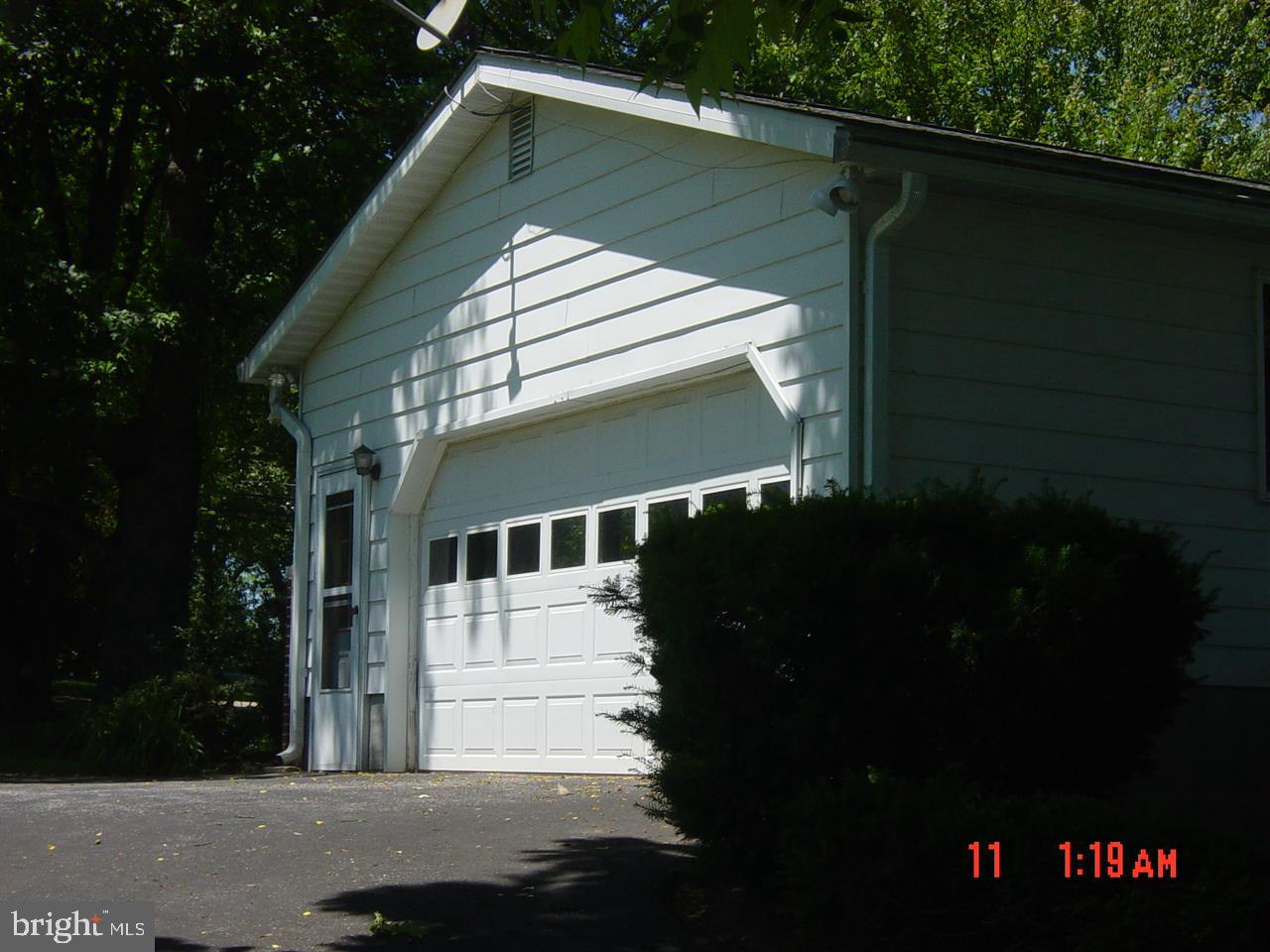 7513 Gaither Road Sykesville, MD 21784 - Photo 4 of 41 Right side with garage entrance