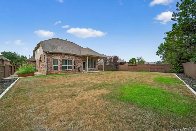 a front view of a house with yard