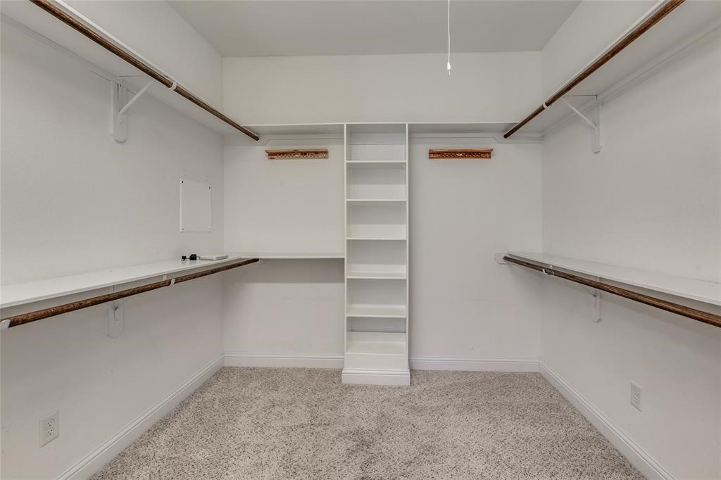 6109 Stillman Street Houston, TX 77007 - Photo 13 of 28 a view of an empty walk in closet