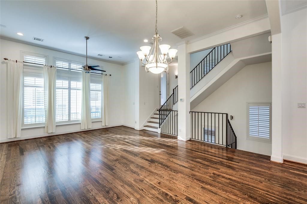 6109 Stillman Street Houston, TX 77007 - Photo 7 of 28 a view of empty room with wooden floor and fan