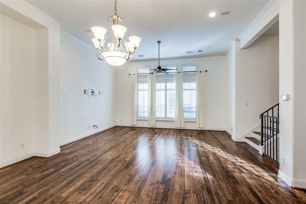 6109 Stillman Street Houston, TX 77007 - Photo 8 of 28 a view of an empty room with wooden floor and a window