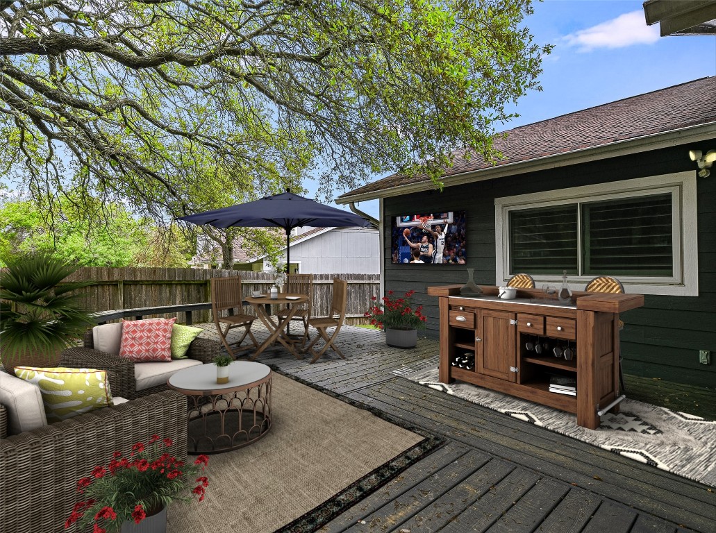 a view of a backyard with sitting area and furniture