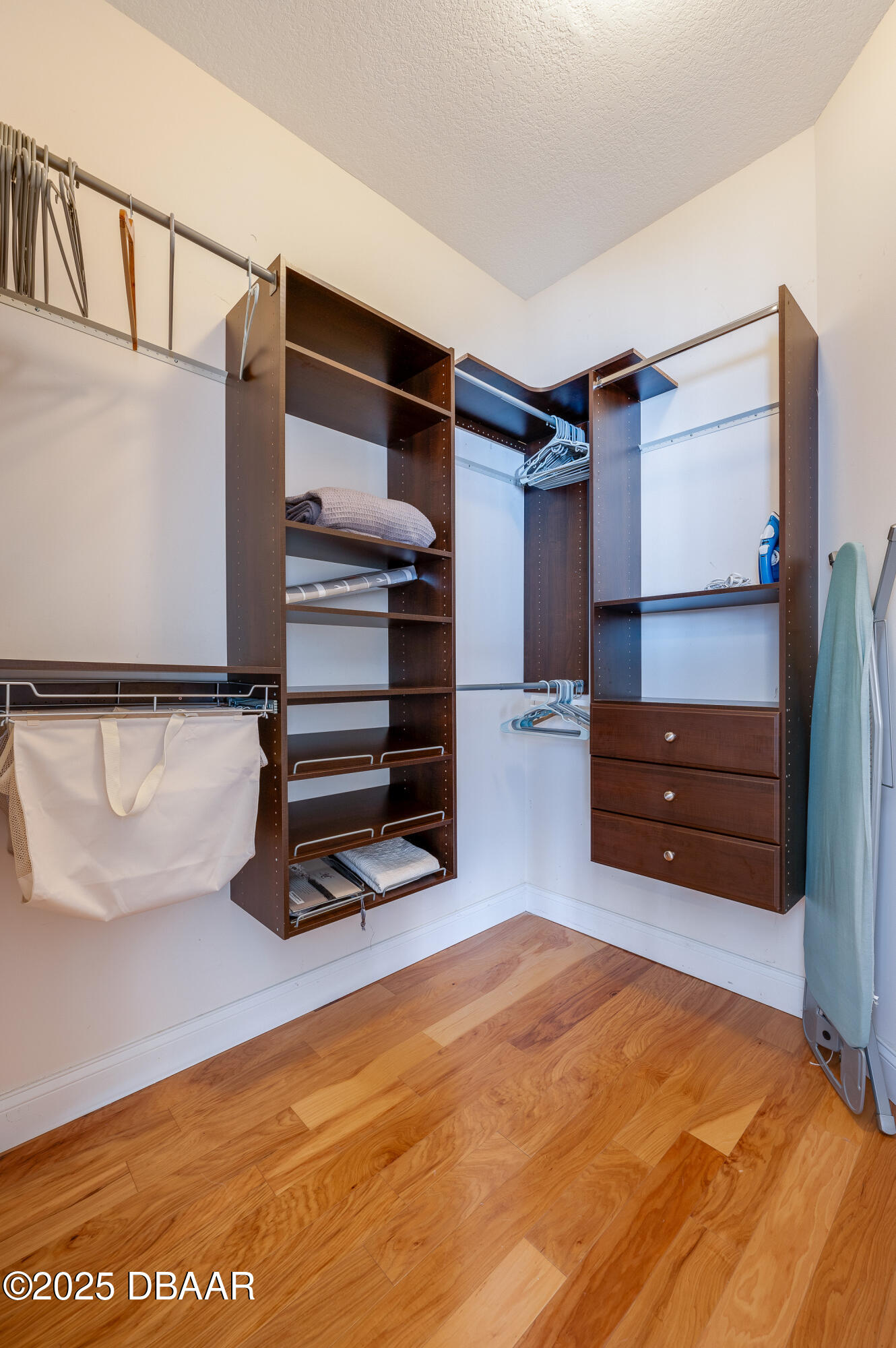 241 Riverside Drive, Unit 2603 Holly Hill, FL 32117 - Photo 41 of 71 a room with furniture and a wooden floor