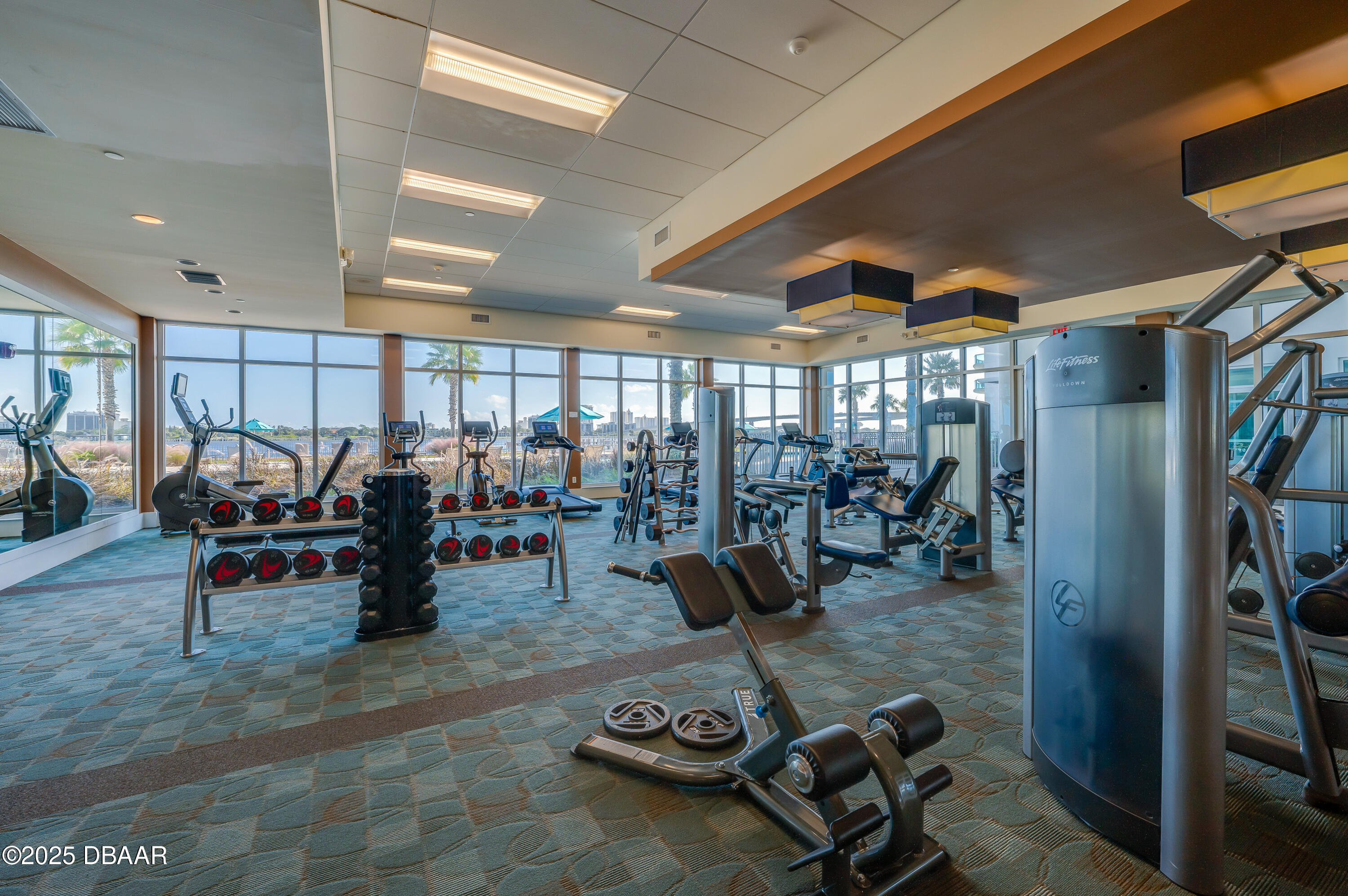 241 Riverside Drive, Unit 2603 Holly Hill, FL 32117 - Photo 53 of 71 a view of a room with gym equipment