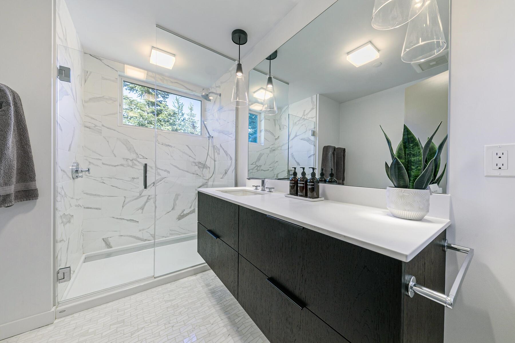 260 Palisades Circle Olympic Valley, CA 96146 - Photo 13 of 28 a bathroom with a double vanity sink mirror and shower
