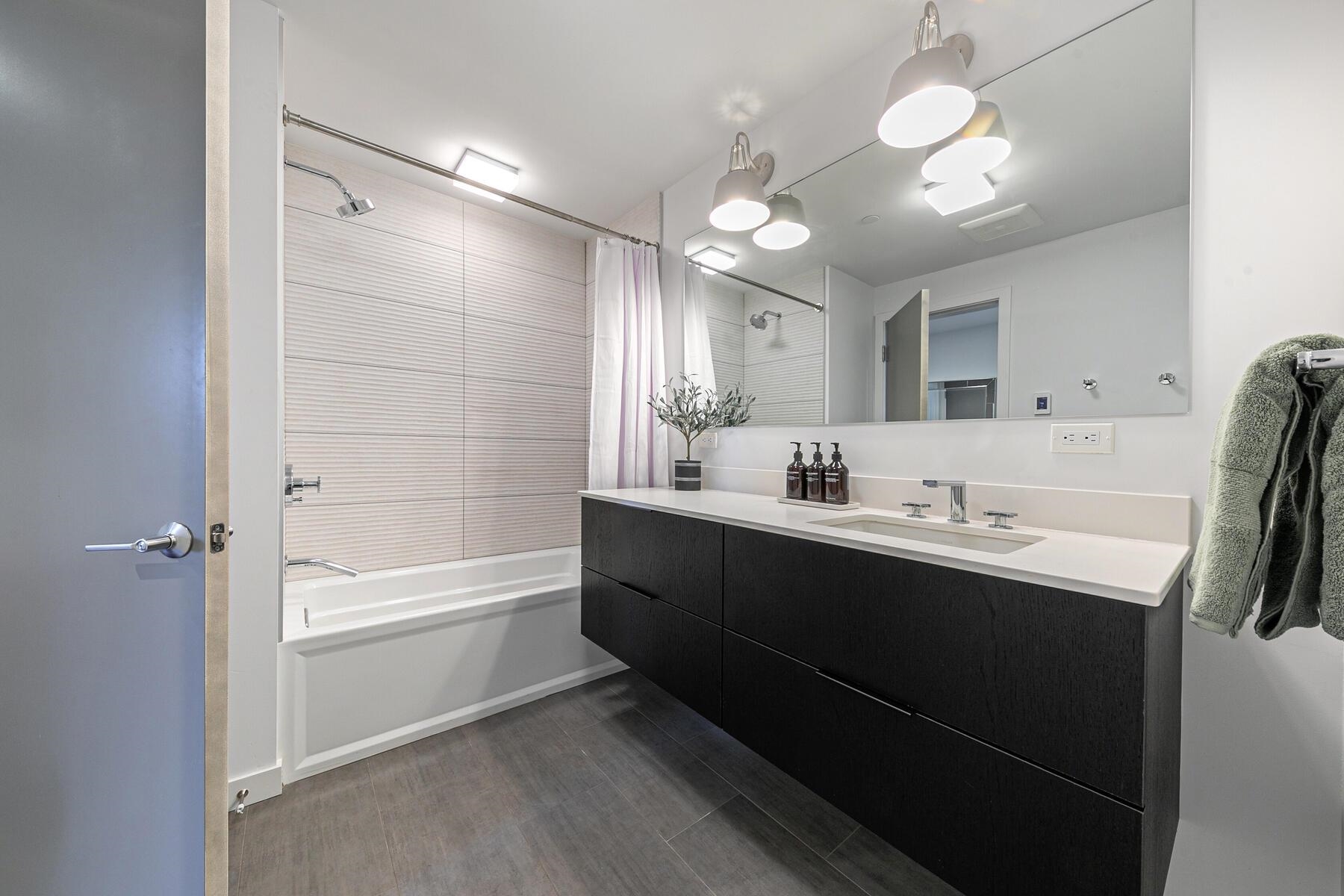 260 Palisades Circle Olympic Valley, CA 96146 - Photo 15 of 28 a bathroom with a sink double vanity granite tub and shower