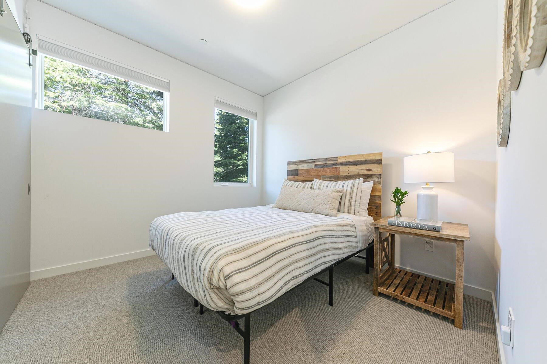 260 Palisades Circle Olympic Valley, CA 96146 - Photo 16 of 28 a bedroom with a bed and a window