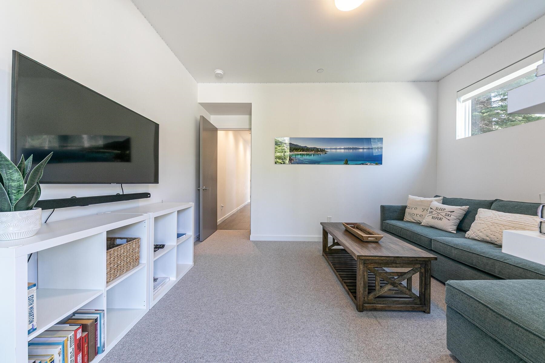 260 Palisades Circle Olympic Valley, CA 96146 - Photo 18 of 28 a living room with furniture and a flat screen tv