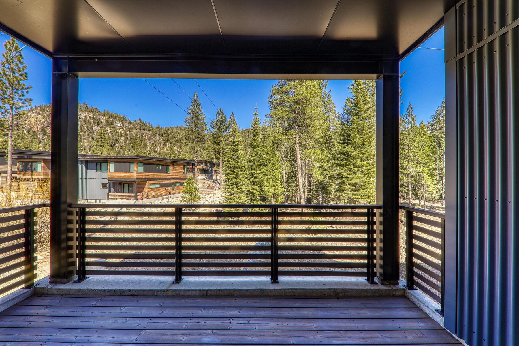 260 Palisades Circle Olympic Valley, CA 96146 - Photo 21 of 28 a view of a balcony with floor to ceiling windows and wooden floor